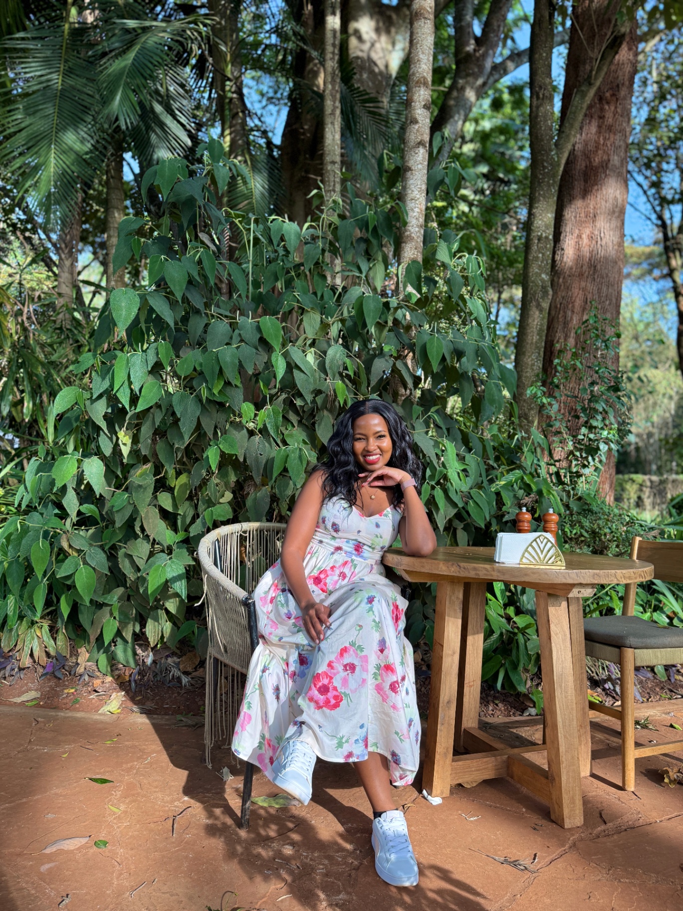 Sabrina seated outdoors